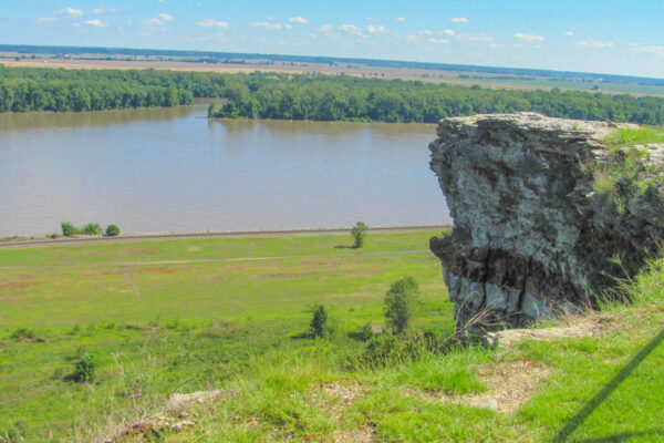Outside image of "Lover's Leap" with a tall cliff overlooking a river