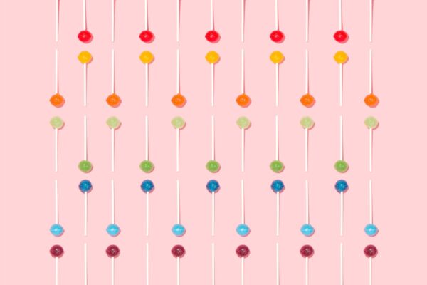 Several Lollipops on a pink screen as a graphic image