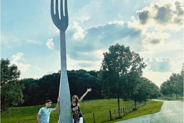 Fork in the Road, world's largest utensil with Stephanie Stuckey promotional advertising picture