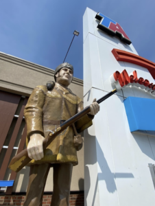 Picture of Davy Crockett statue standing outside Davy Crockett TA Travel Center near Greenville Tennessee.