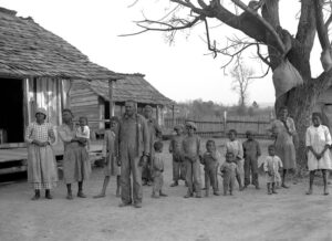 Photo of former family of former slaves in Alabama,, taken in 1937.