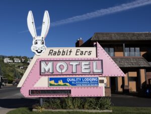 Picture of the Rabbit Ears Motel sign during the day. 