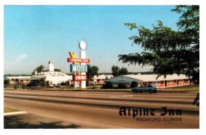 Postcard photographof the exterior of the Alpine in in Rockford, IL circa 1970s.