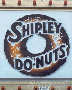 picture of the Shipley Do-Nuts log on the backof a truck.